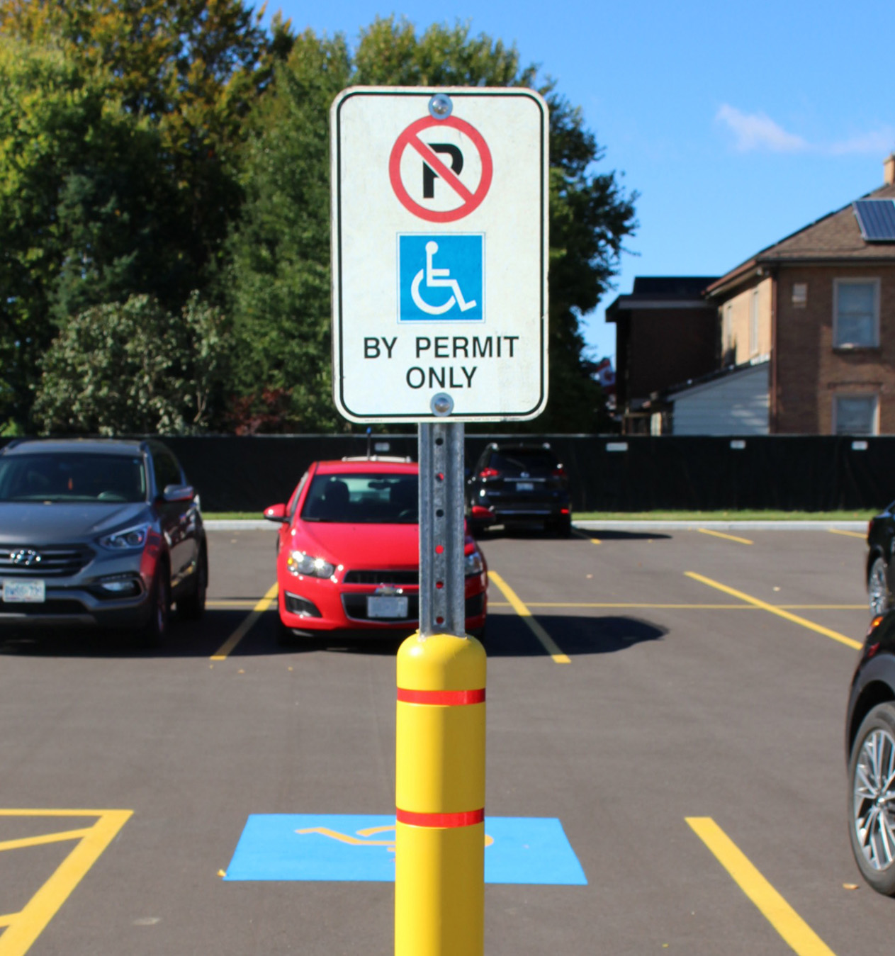 By Permit Only Parking Sign