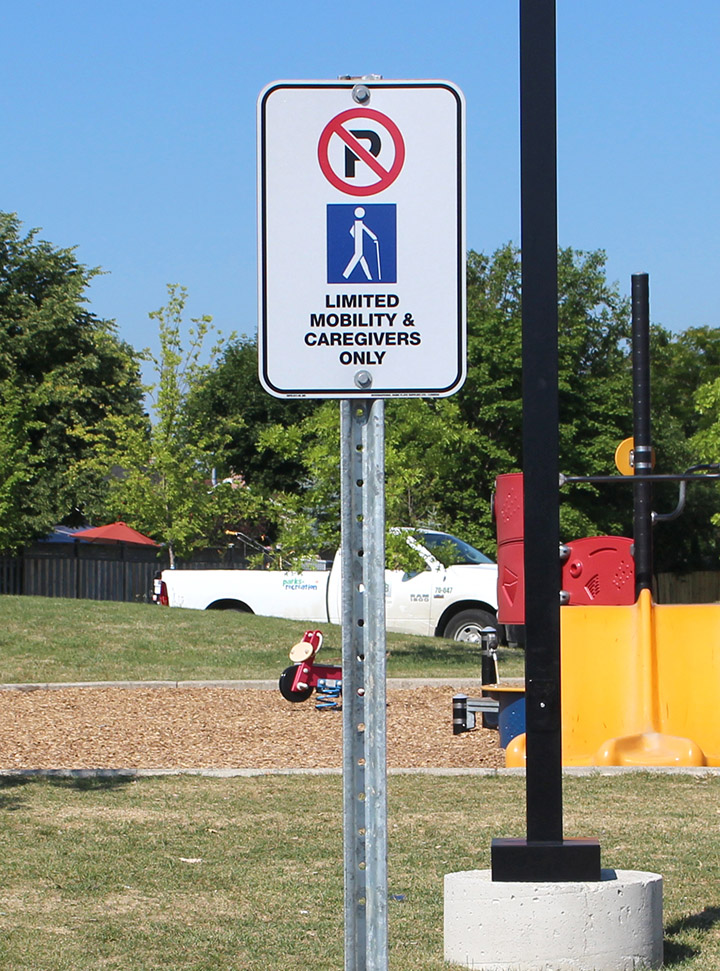 Limited Mobility & Caregivers Only Parking Sign