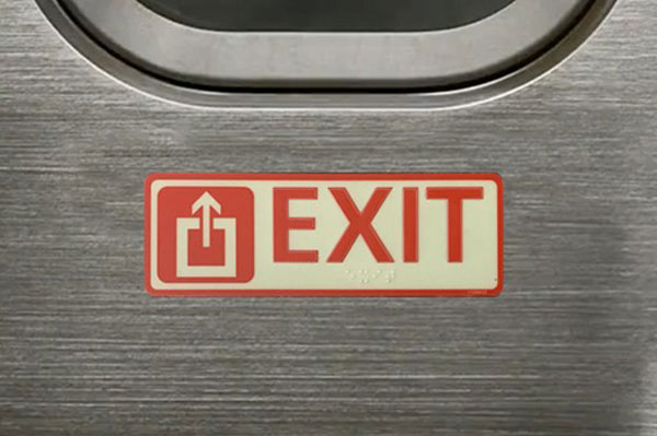 exit sign on passenger train photoluminescent