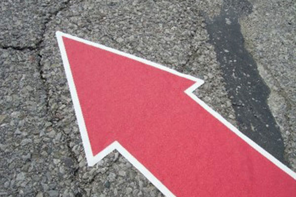 floor graphics arrow on street