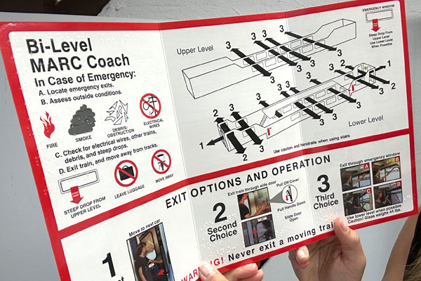 safety card train braille exit locations