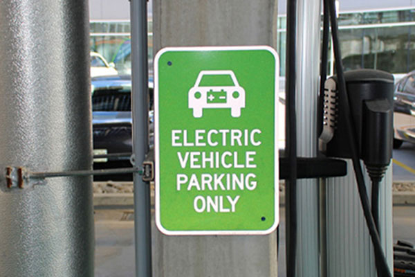 electric vehicle parking only sign