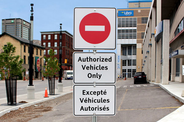 custom parking lot signs bilingual