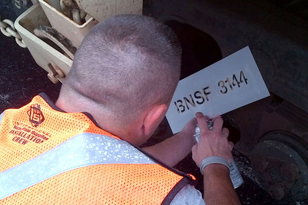 stencil application remarking railcar