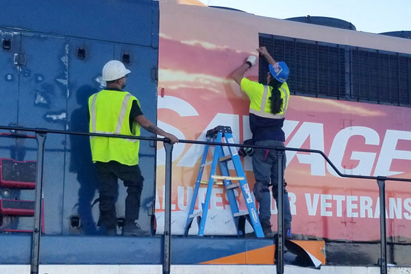installation of locomotive vinyl wrap remarking