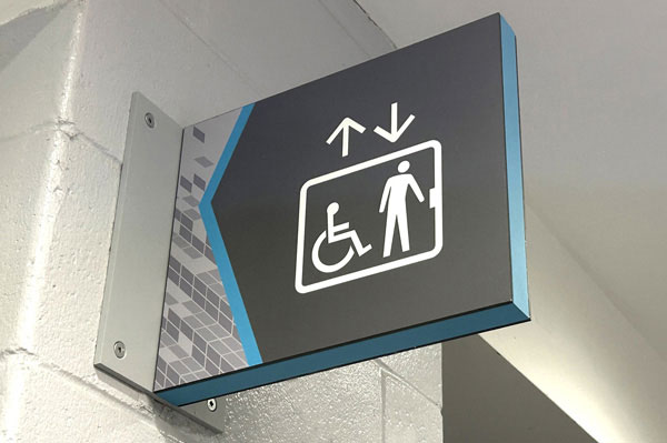 Wayfinding elevator sign